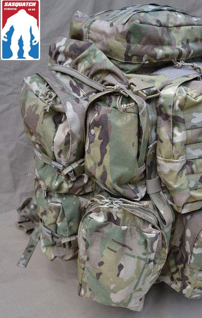 Left side external view of the ruck sacke - showing four of the nine external pockets - partial view of 2 center rear external pockets with molle webbing - huge ruck - tactical ruck - ocp ruck - SOF ruck - rucksack - black - coyote - sasquatch - bigfoot - camping - hiking- never alone- top lid pocket with molle webbing - backpack - go ruck - tactical ruck - Yowie Ruck sack. - SquatchSurvivalGear